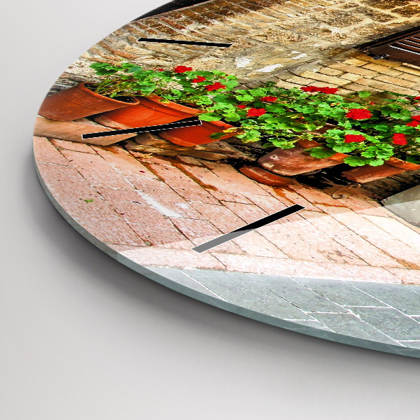 Round glass clock A picturesque street