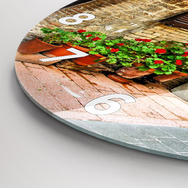 Round glass clock A picturesque street