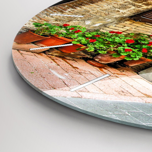 Round glass clock A picturesque street