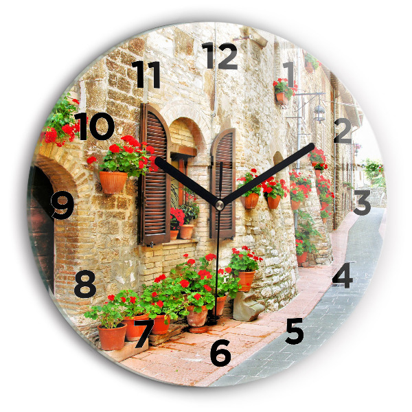 Round glass clock A picturesque street