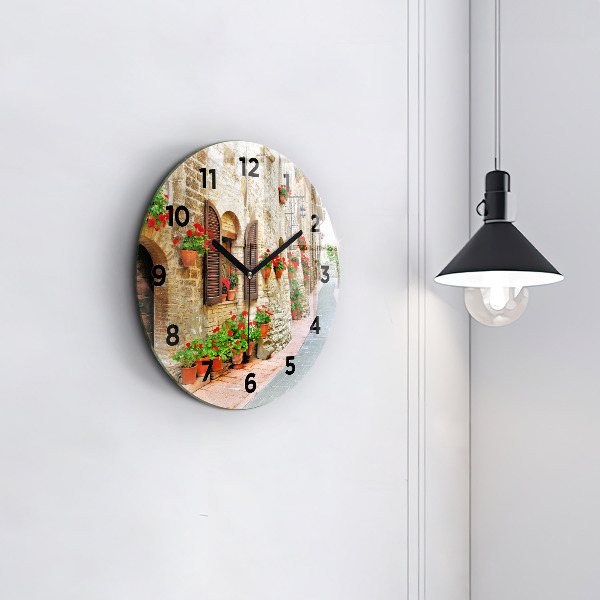 Round glass clock A picturesque street