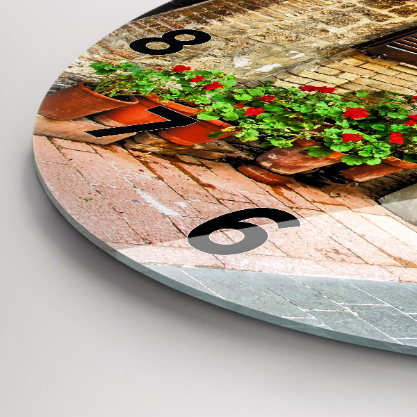 Round glass clock A picturesque street