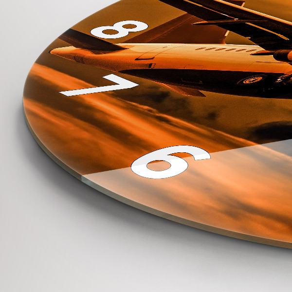 Round glass clock Travel by plane