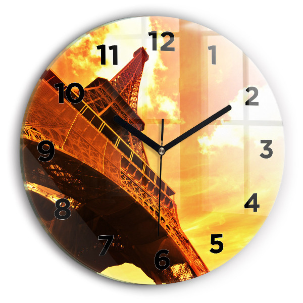 Round glass clock The Eiffel Tower in Paris