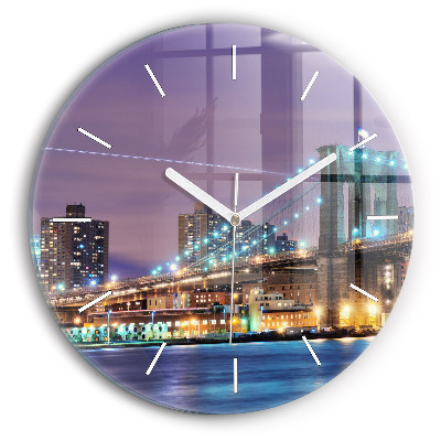 Round glass clock Brooklyn Bridge and East River