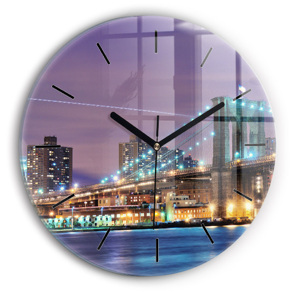 Round glass clock Brooklyn Bridge and East River