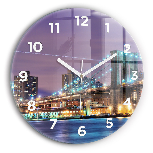 Round glass clock Brooklyn Bridge and East River