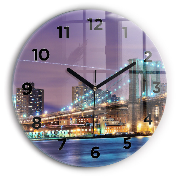 Round glass clock Brooklyn Bridge and East River
