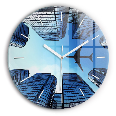 Round glass clock Airplane over buildings