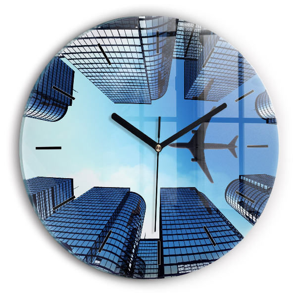 Round glass clock Airplane over buildings