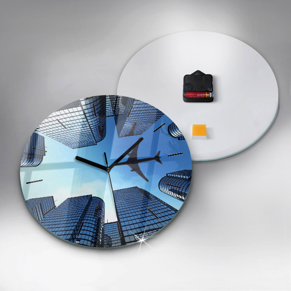 Round glass clock Airplane over buildings