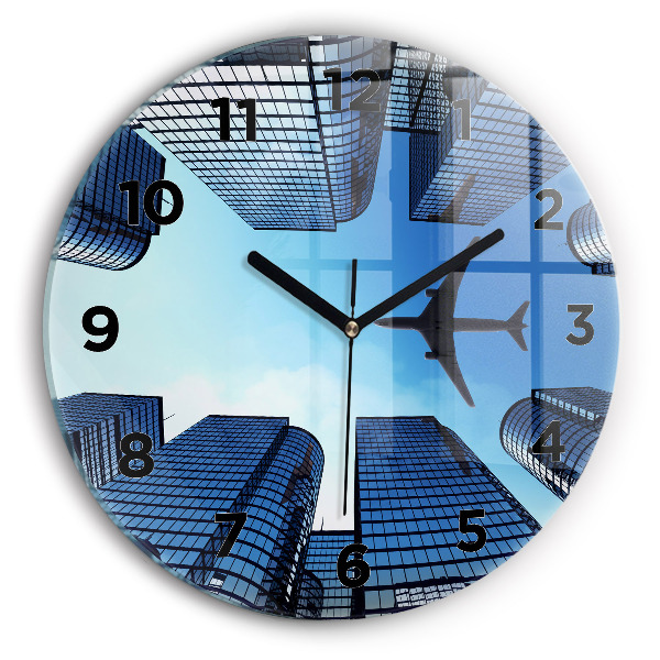 Round glass clock Airplane over buildings
