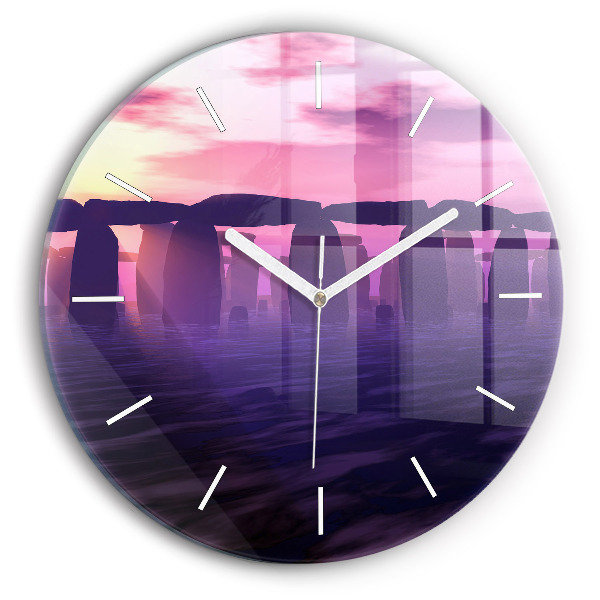 Round glass clock Sunset at Stonehenge