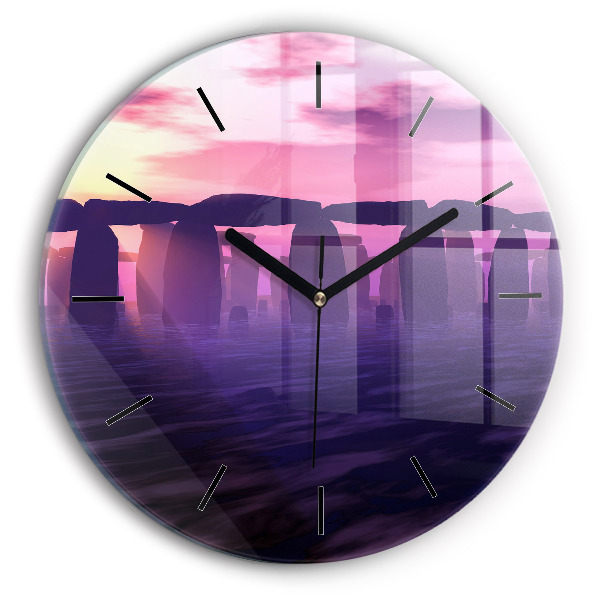 Round glass clock Sunset at Stonehenge