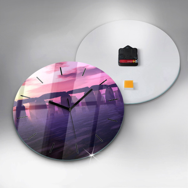 Round glass clock Sunset at Stonehenge