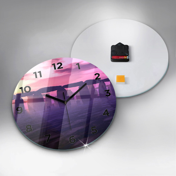 Round glass clock Sunset at Stonehenge