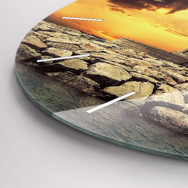 Round glass clock Lighthouse on the water