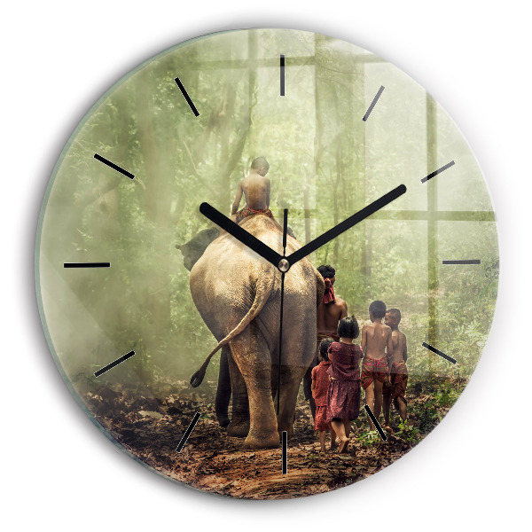 Round glass clock Children leading an elephant