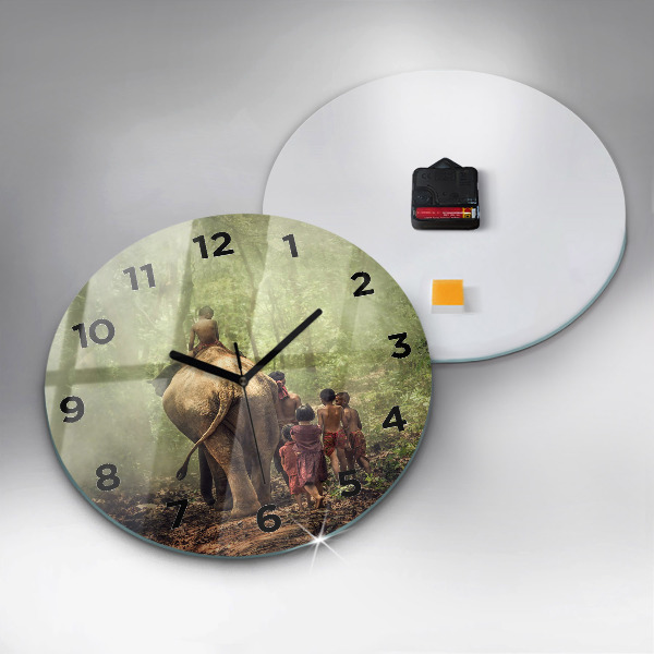 Round glass clock Children leading an elephant