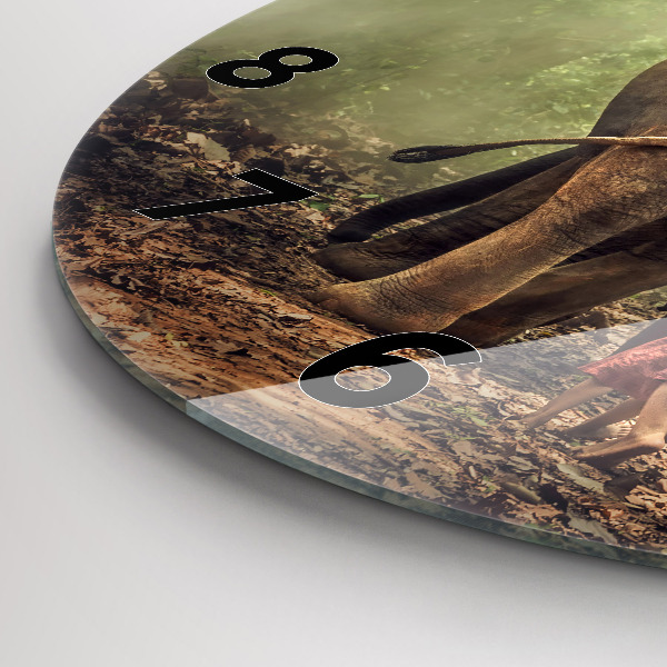 Round glass clock Children leading an elephant
