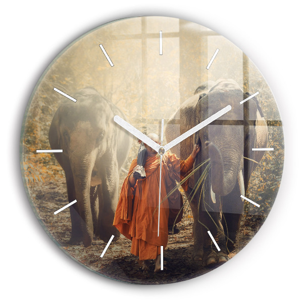 Round glass clock Monk leading elephants
