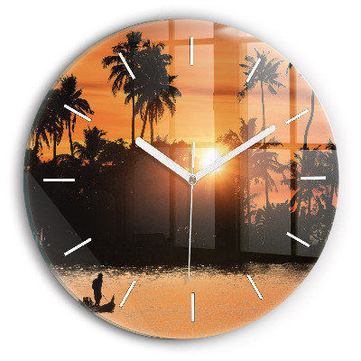 Round glass clock Sunset and palm trees