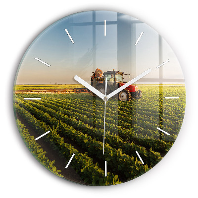 Round glass clock Tractor in a farm field