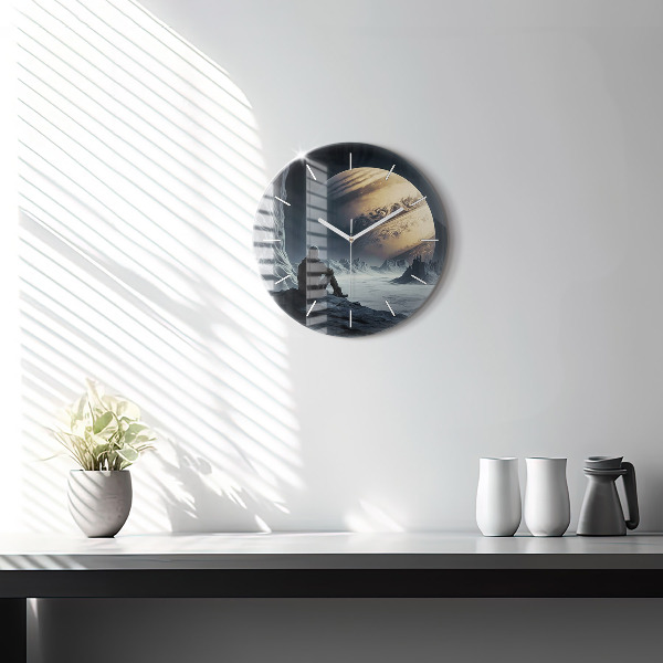 Round glass clock Man in front of the moon