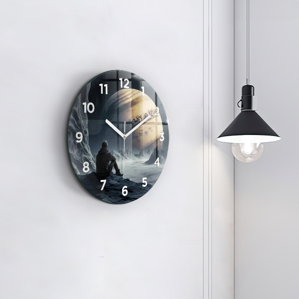 Round glass clock Man in front of the moon