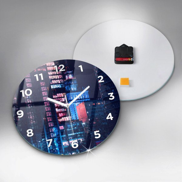 Round glass clock Warsaw at night
