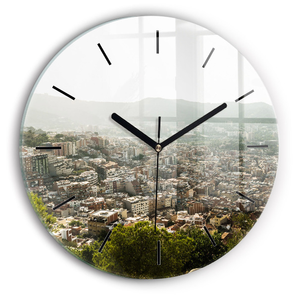 Round glass clock Barcelona view Montjuic