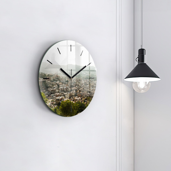 Round glass clock Barcelona view Montjuic