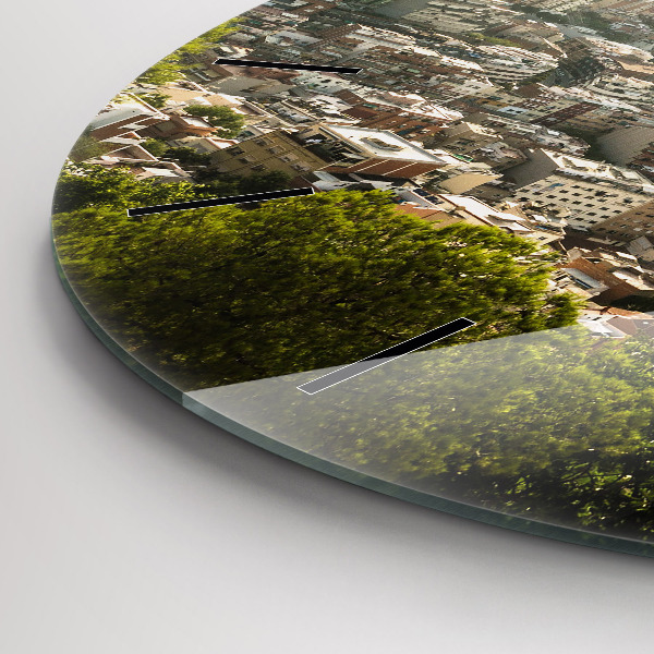 Round glass clock Barcelona view Montjuic