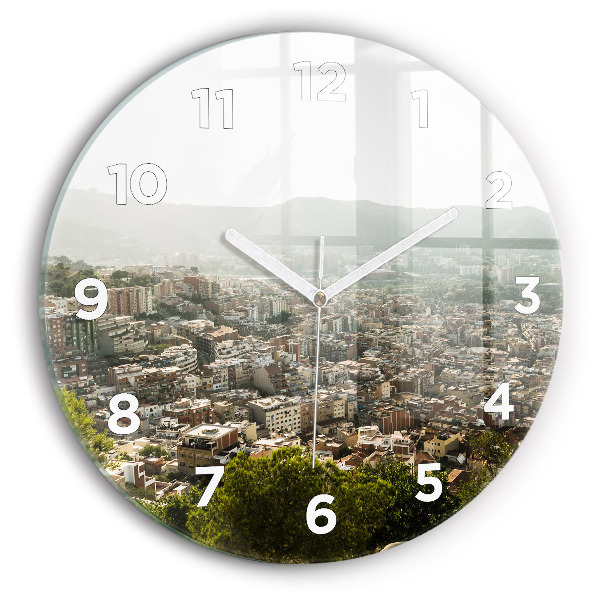 Round glass clock Barcelona view Montjuic