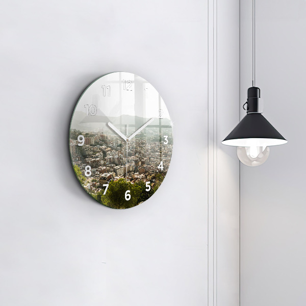 Round glass clock Barcelona view Montjuic