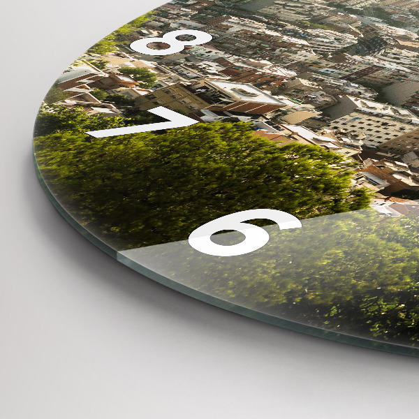 Round glass clock Barcelona view Montjuic