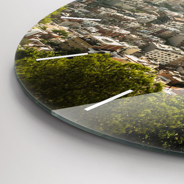 Round glass clock Barcelona view Montjuic