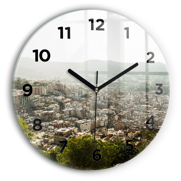 Round glass clock Barcelona view Montjuic