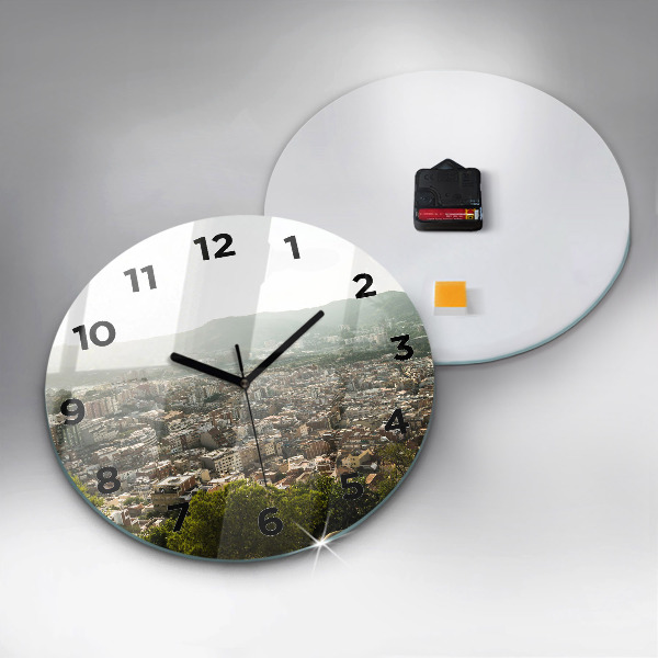 Round glass clock Barcelona view Montjuic