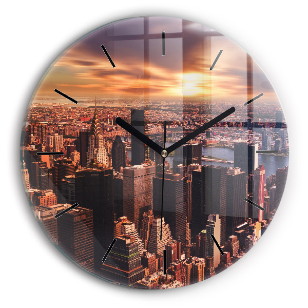Round glass clock Panorama of the city west