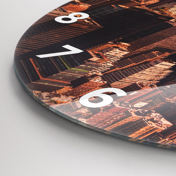 Round glass clock Panorama of the city west