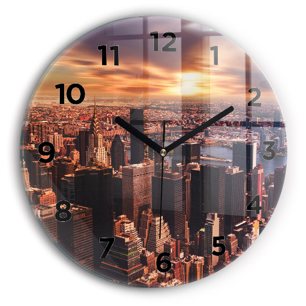 Round glass clock Panorama of the city west