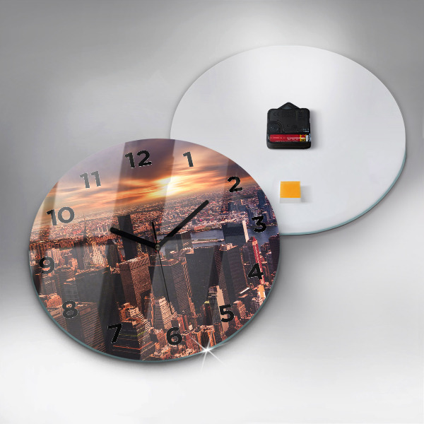 Round glass clock Panorama of the city west
