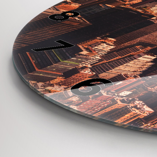 Round glass clock Panorama of the city west