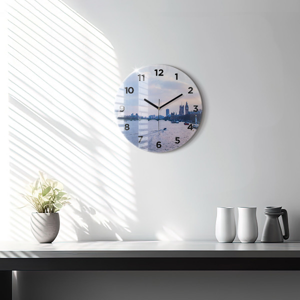 Round glass clock London Eye city panorama