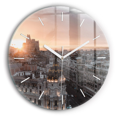 Round glass clock Cities at sunset