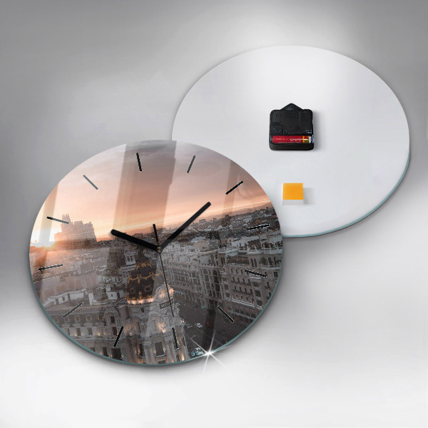 Round glass clock Cities at sunset