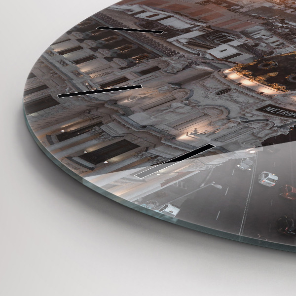 Round glass clock Cities at sunset