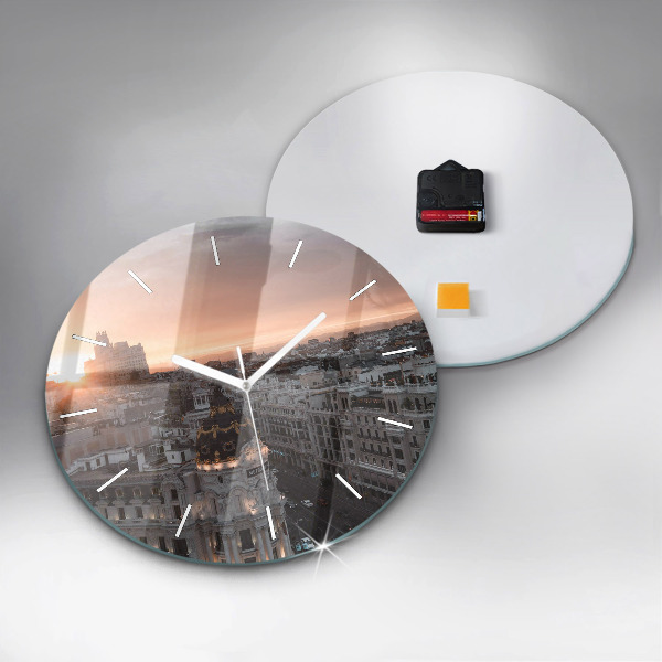 Round glass clock Cities at sunset