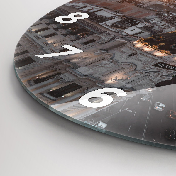 Round glass clock Cities at sunset